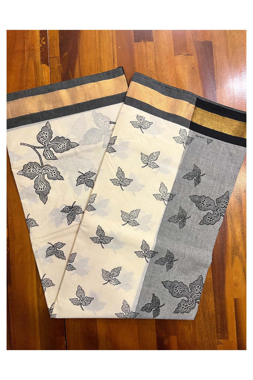 Pure Cotton Kerala Saree with Black Block Print Leaf Designs and Kasavu Border (Vishu 2024 Collection)