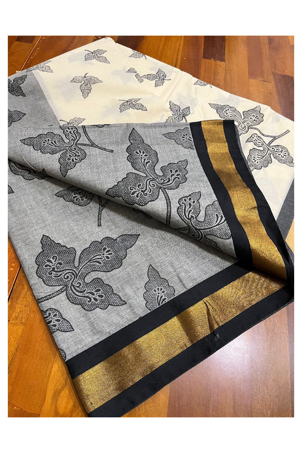 Pure Cotton Kerala Saree with Black Block Print Leaf Designs and Kasavu Border (Vishu 2024 Collection)