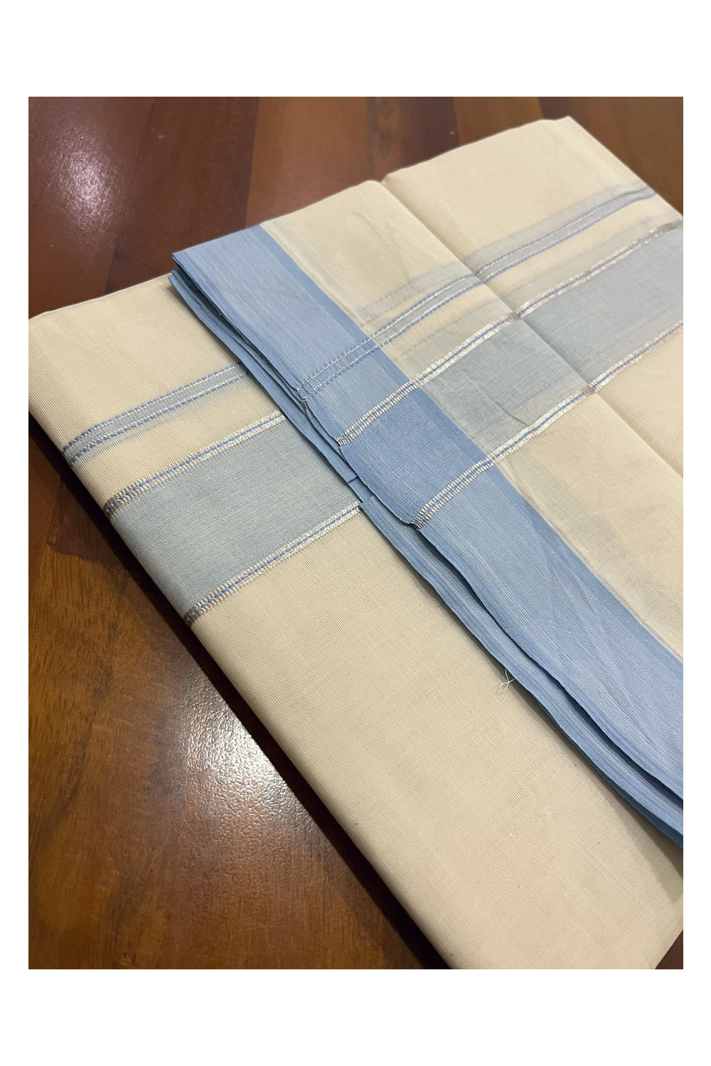 Pure Cotton 100x100 Double Mundu with Silver Kasavu and Light Blue Kara (Onam Mundu 2023)