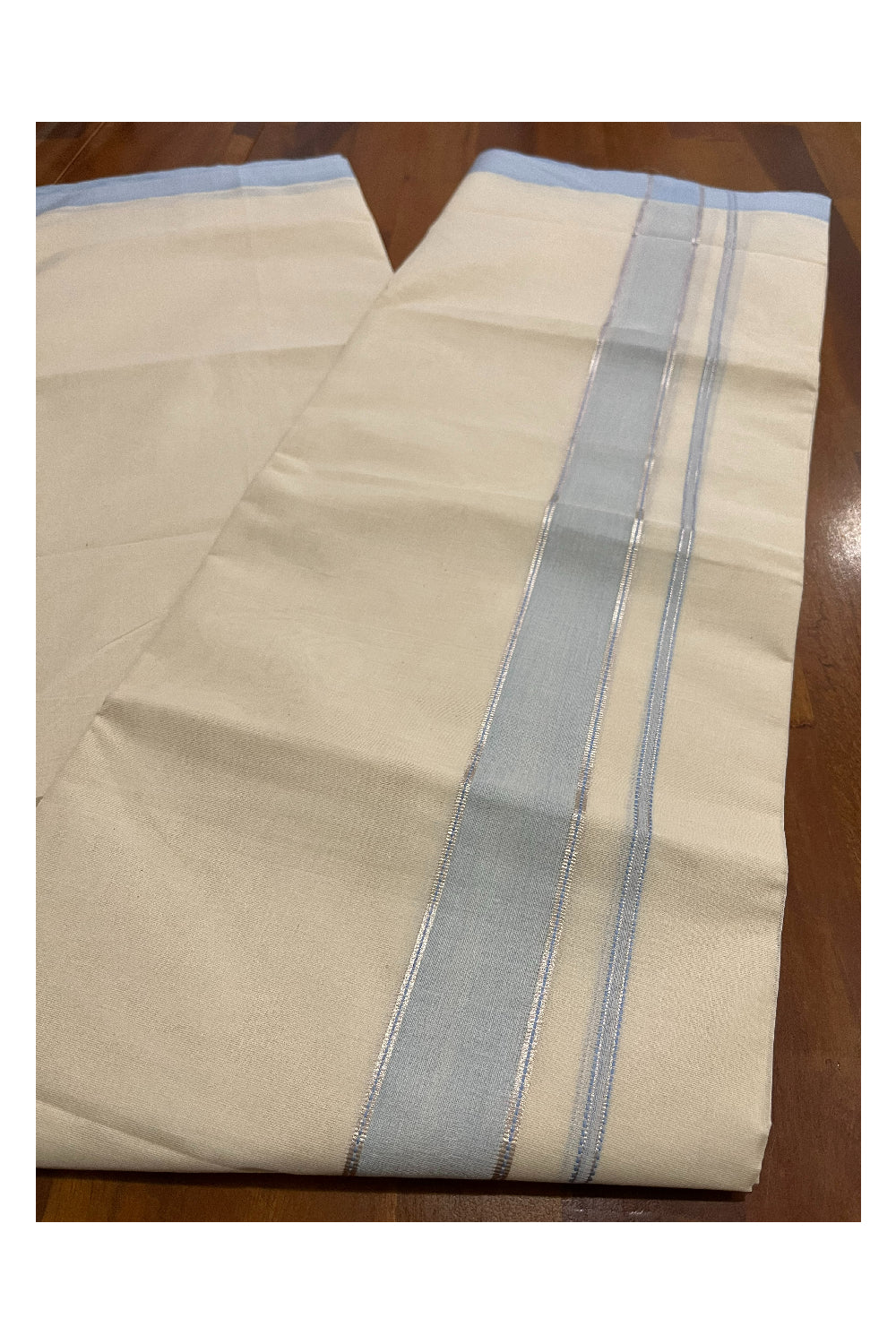 Pure Cotton 100x100 Double Mundu with Silver Kasavu and Light Blue Kara (Onam Mundu 2023)