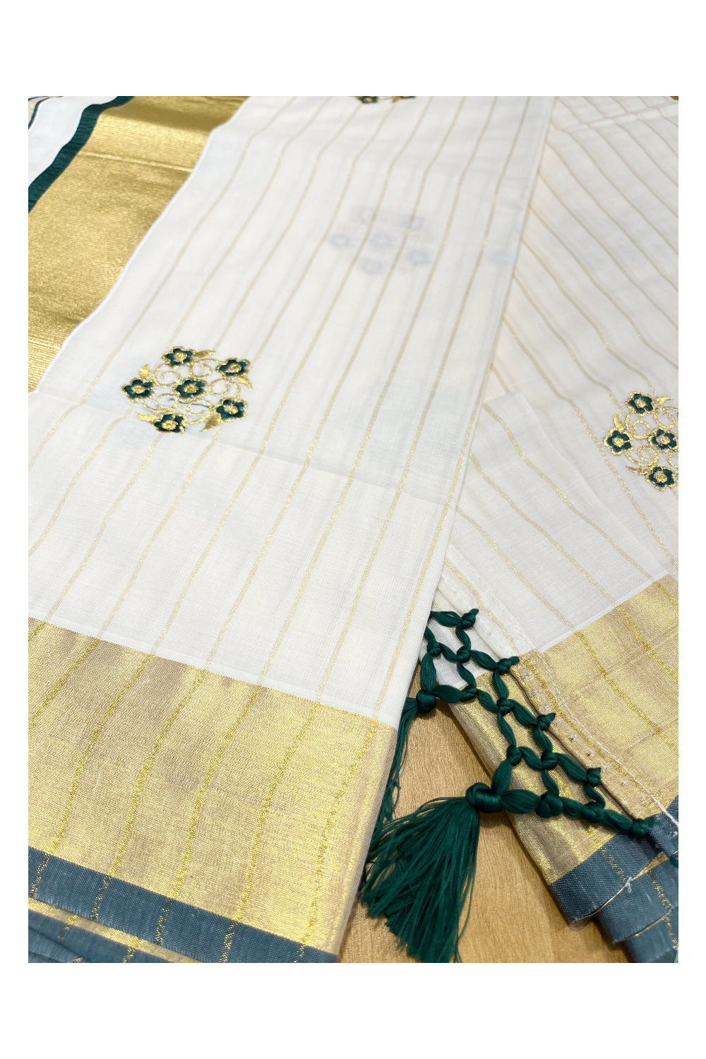 Kerala Cotton Kasavu Lines Saree with Green and Golden Floral Embroidery Work