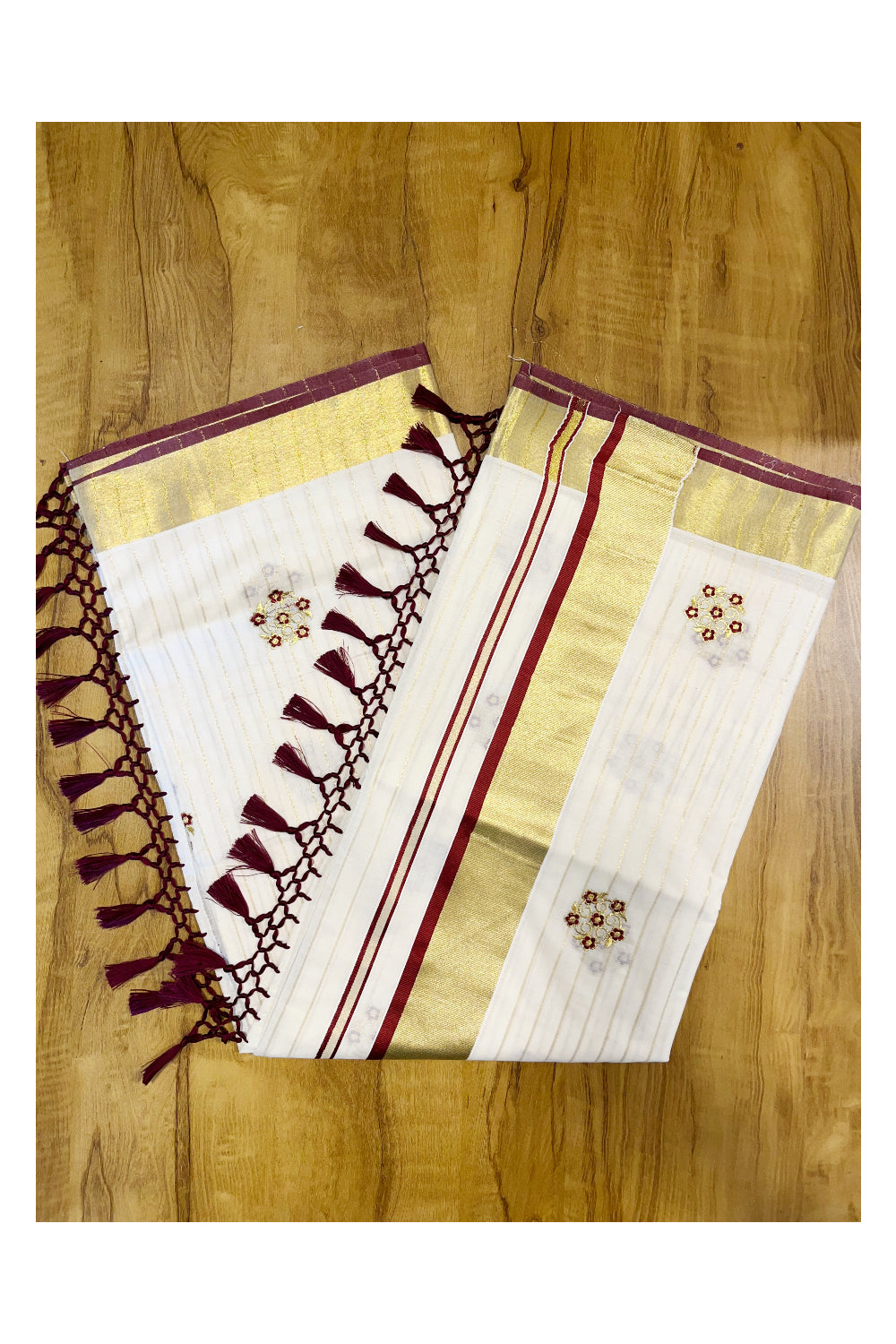 Kerala Cotton Kasavu Lines Saree with Maroon and Golden Floral Embroidery Work