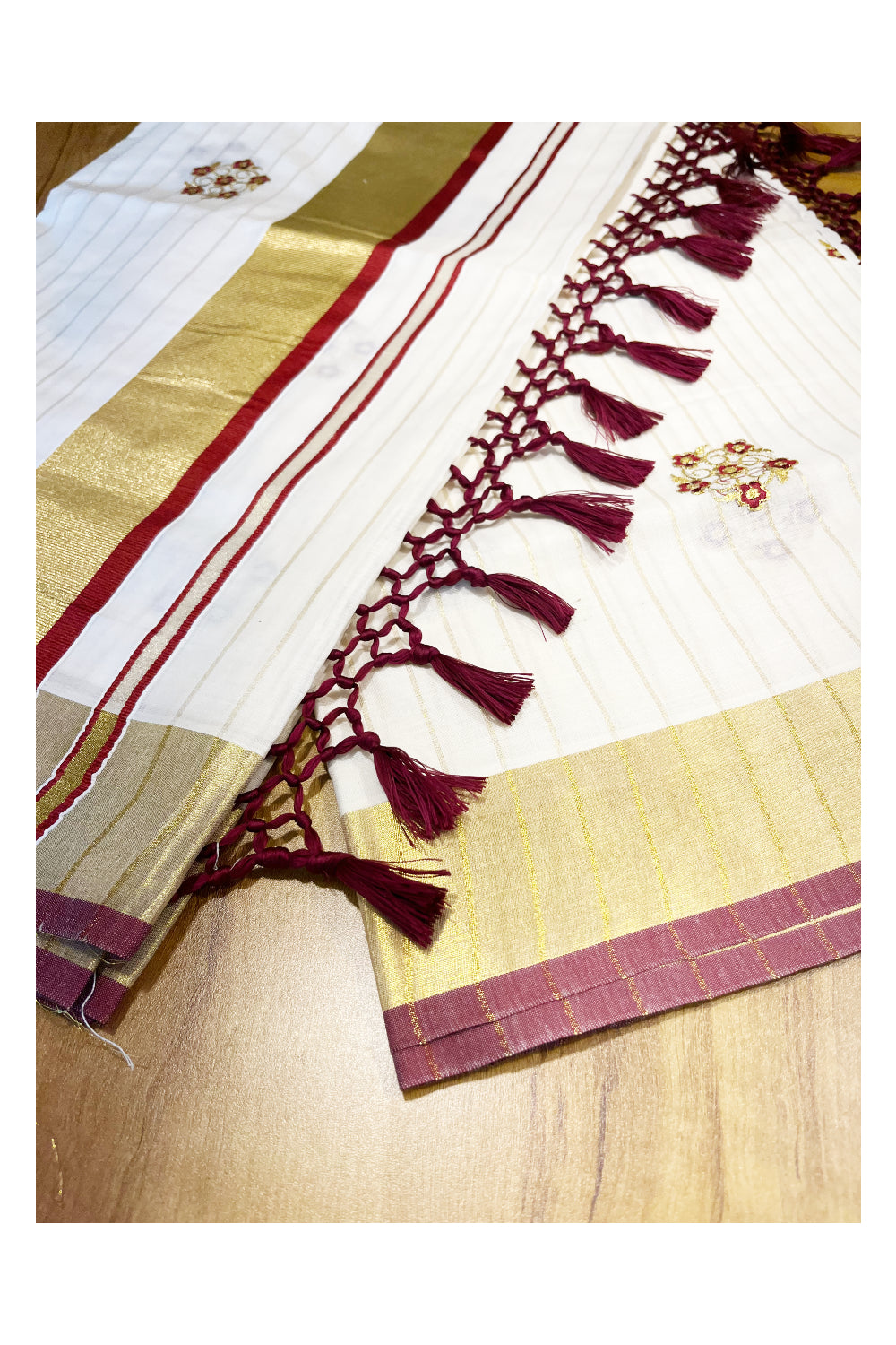 Kerala Cotton Kasavu Lines Saree with Maroon and Golden Floral Embroidery Work