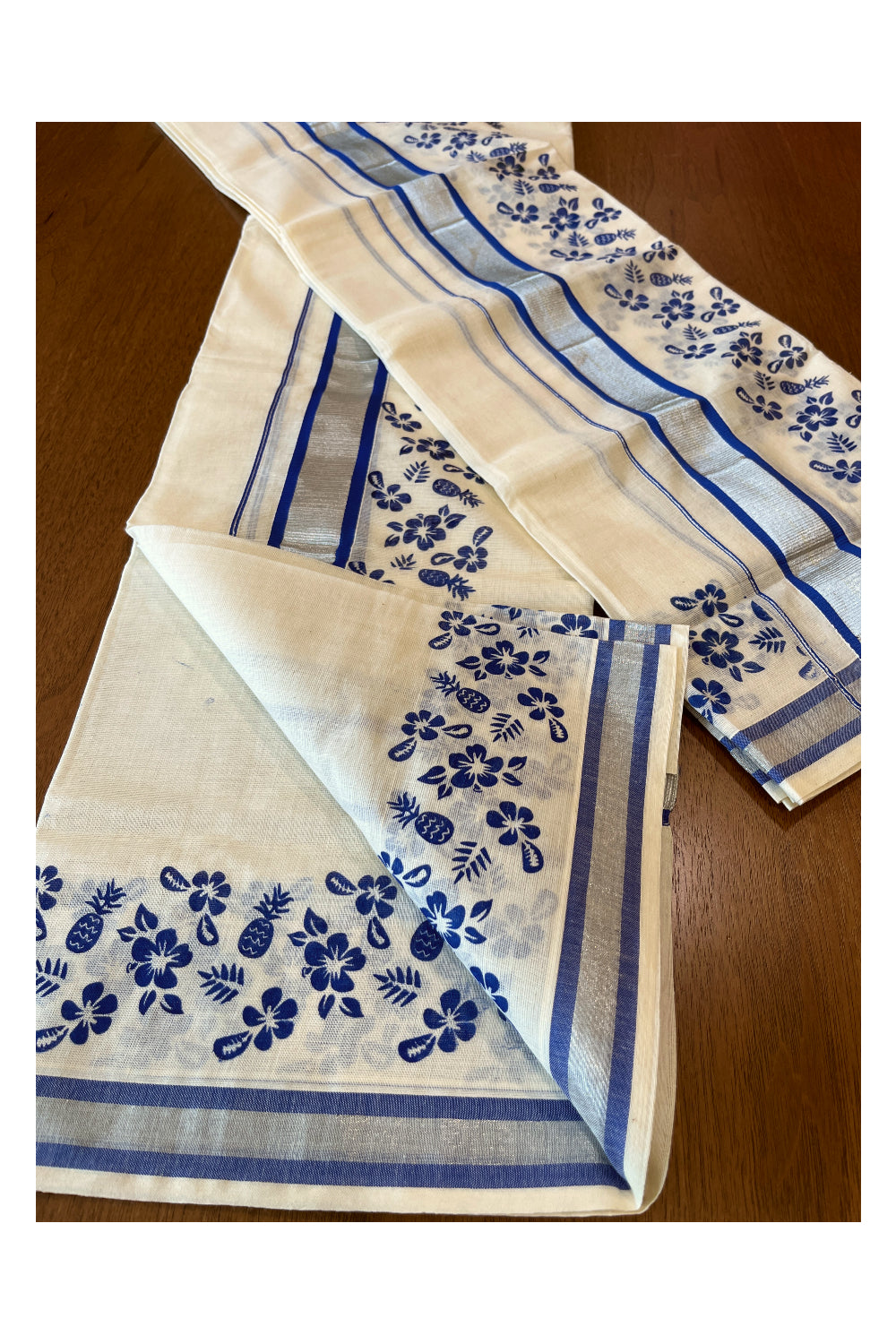 Pure Cotton Single Set Mundu (Mundum Neriyathum) with Silver Kasavu and Blue Floral Block Prints