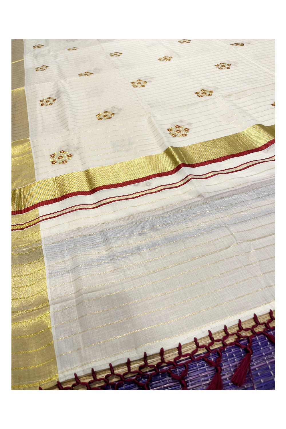 Kerala Cotton Kasavu Lines Saree with Maroon and Golden Floral Embroidery Work