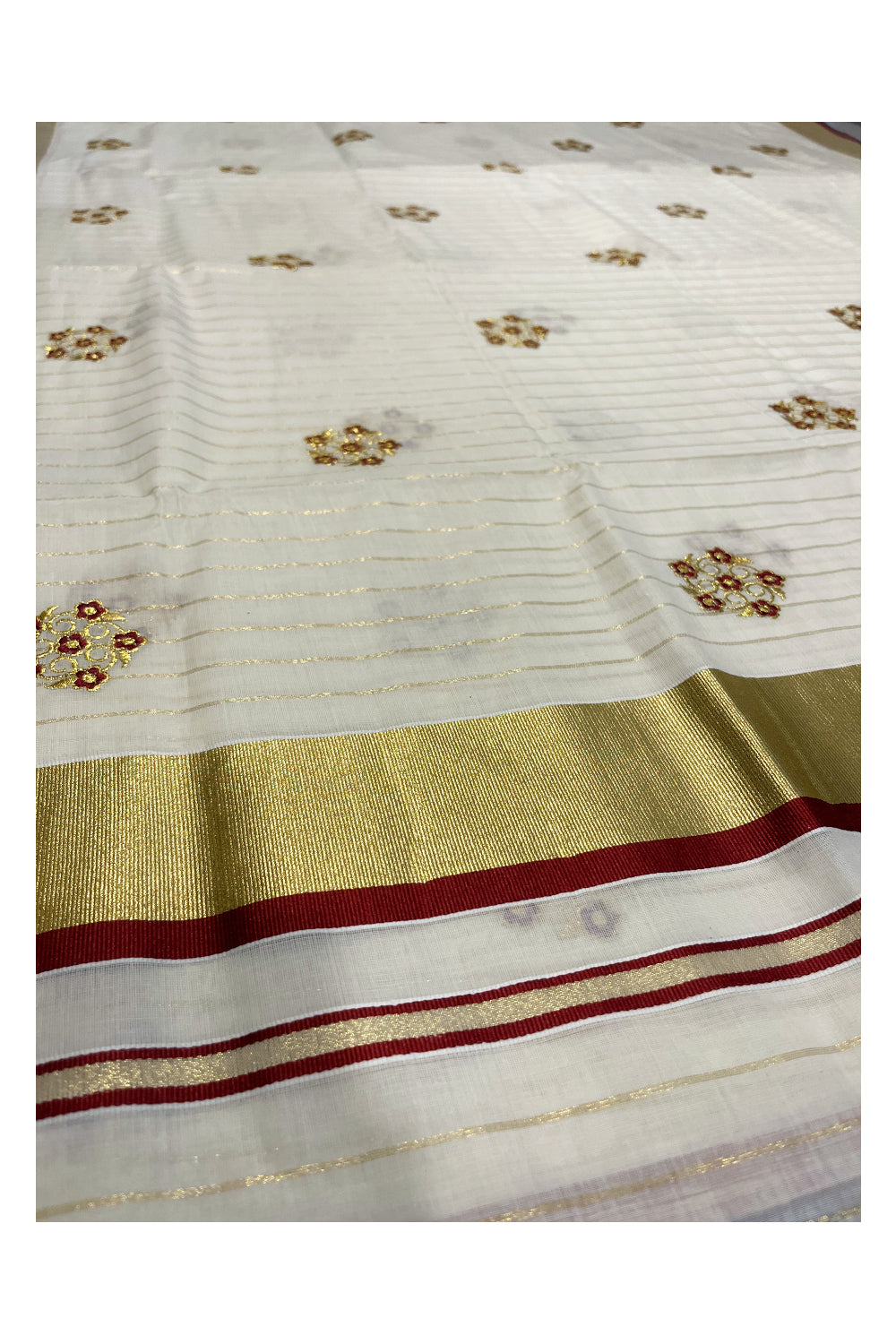 Kerala Cotton Kasavu Lines Saree with Maroon and Golden Floral Embroidery Work