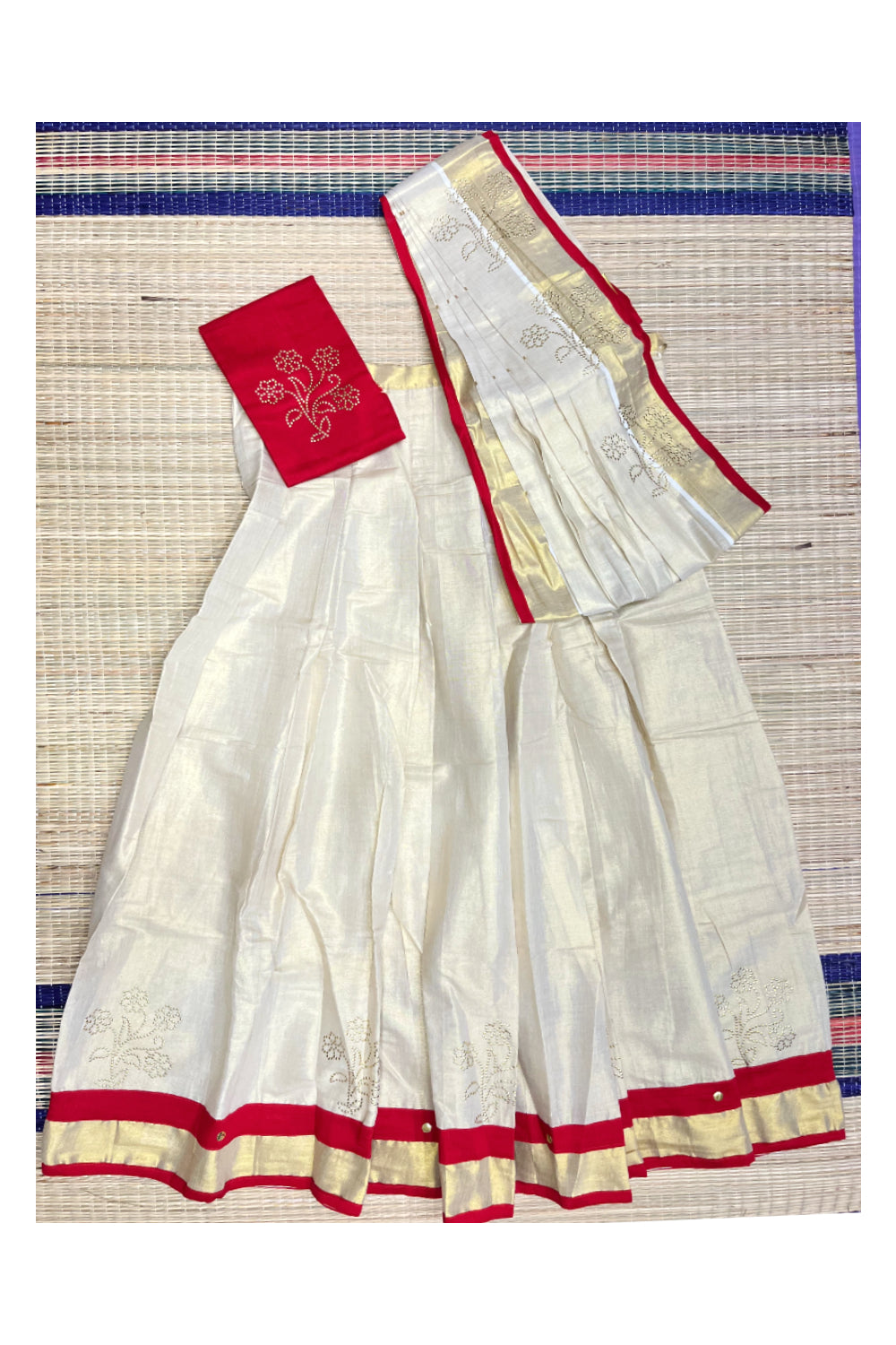 Kerala Tissue Semi Stitched Dhavani Set With Kasavu Pavada and Red  Flower Work Blouse Piece