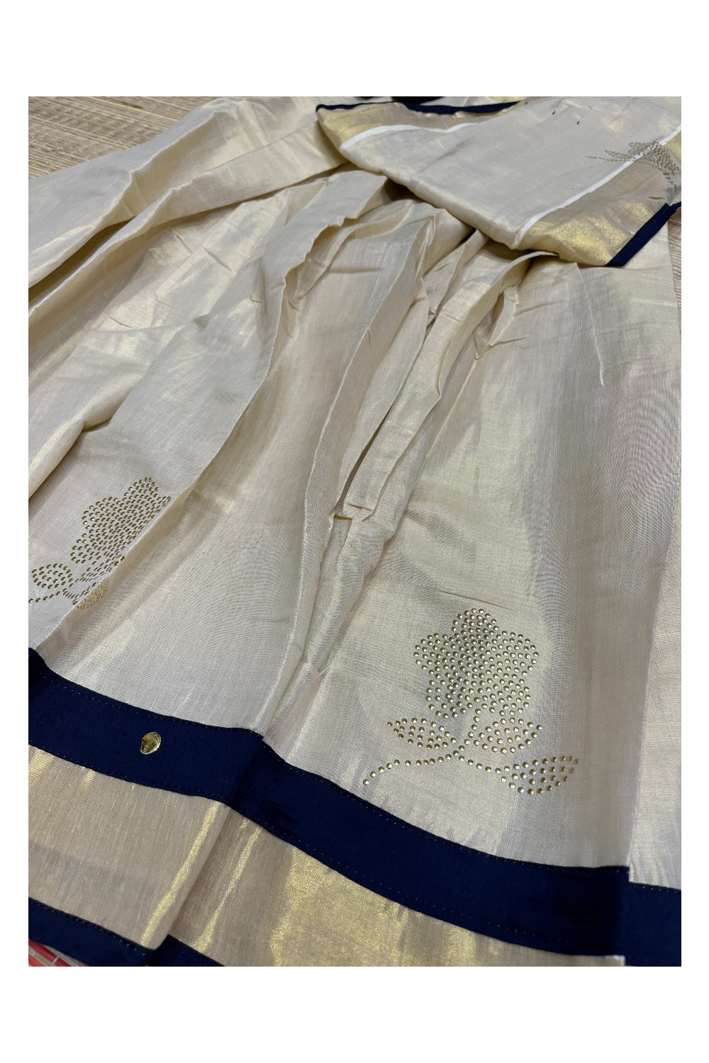 Kerala Tissue Semi Stitched Dhavani Set With Kasavu Pavada and Blue Flower Work Blouse Piece