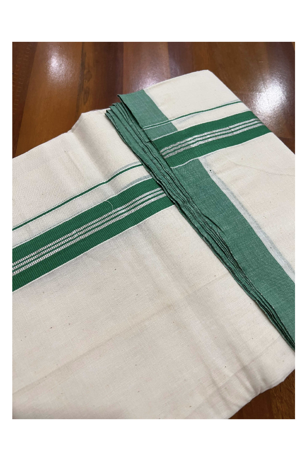 Off White Cotton Mundu with Green and Silver Kasavu Border (South Indian Dhoti)