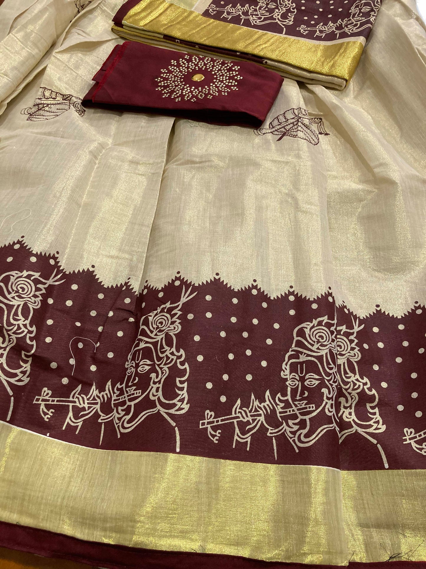 Kerala Tissue Stitched Dhavani Set with Blouse Piece and Neriyathu in with Maroon Accents and Mural Designs