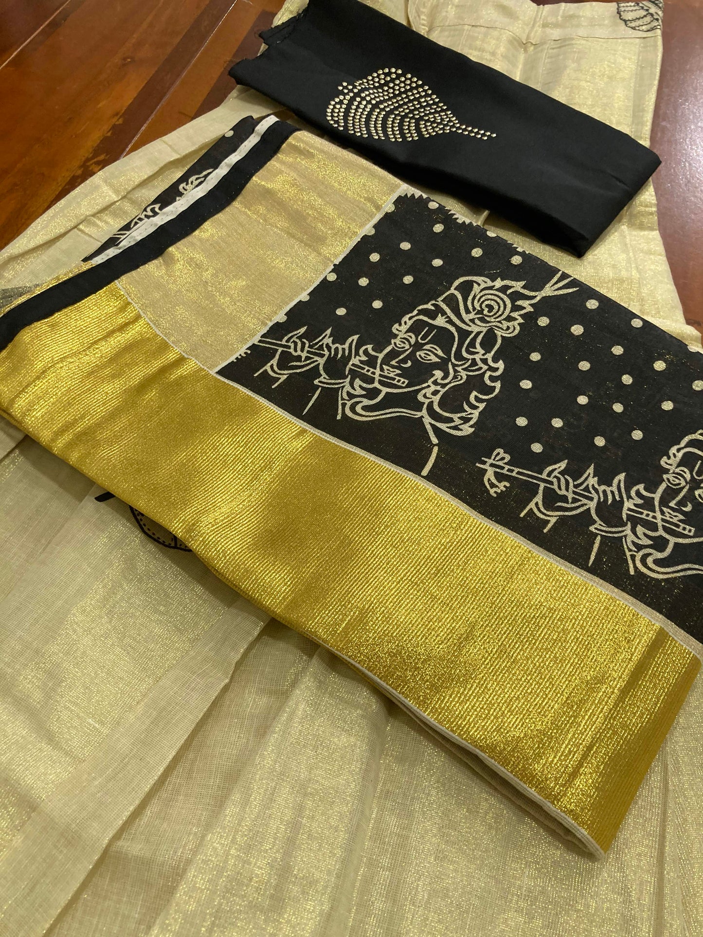 Kerala Tissue Stitched Dhavani Set with Blouse Piece and Neriyathu in with Black Accents and Mural Designs
