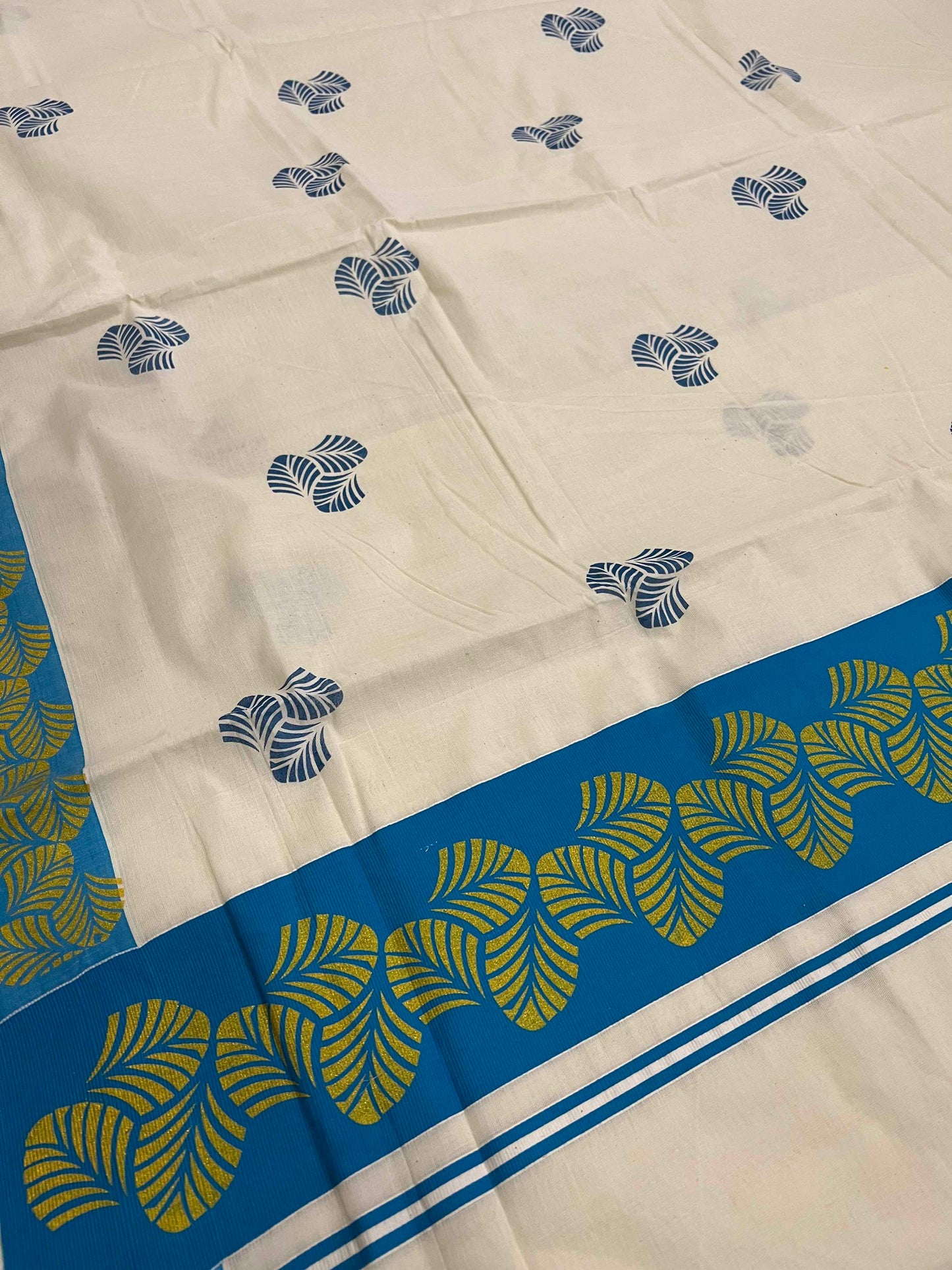 Off White Pure Cotton Kerala Saree with Block Prints on Blue Border