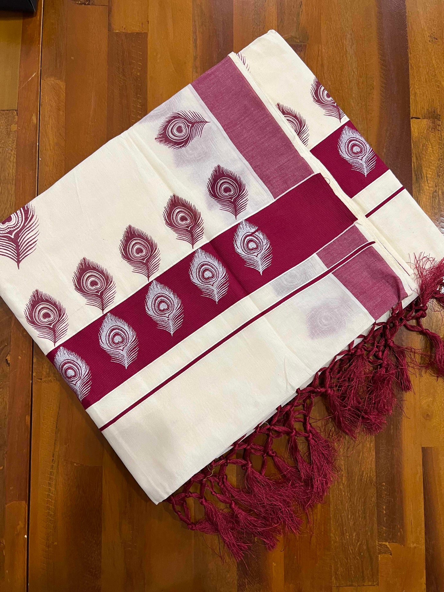 Off White Pure Cotton Kerala Saree with Peacock Feather Block Prints on Maroon Border and Tassels on Pallu