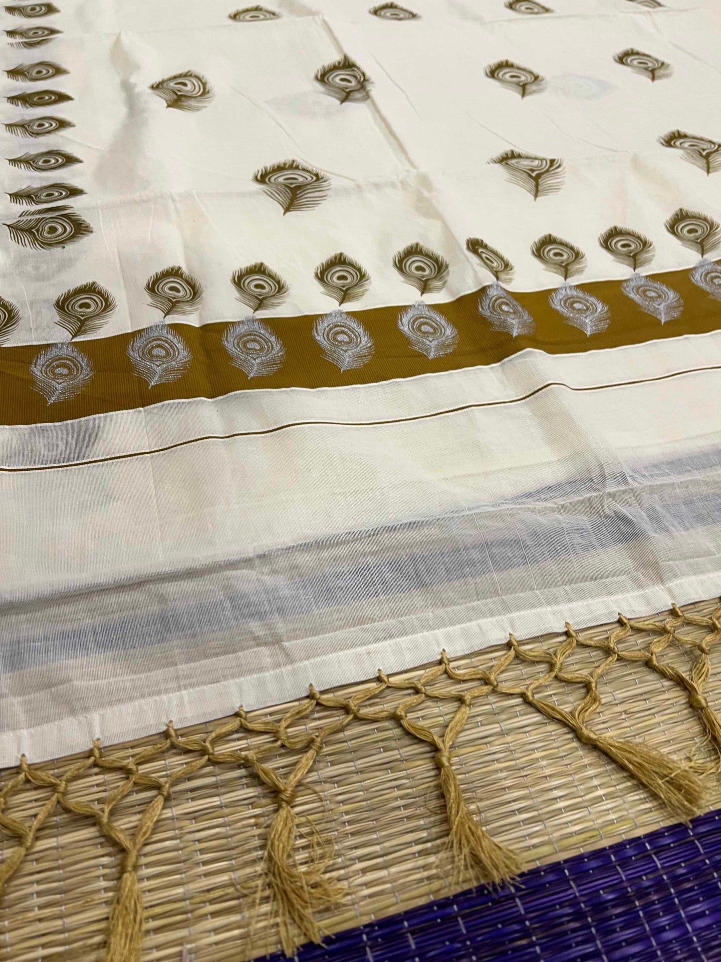 Off White Pure Cotton Kerala Saree with Peacock Feather Block Prints on Olive Border and Tassels on Pallu