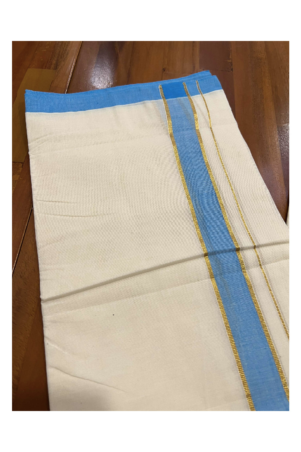 Off White Cotton Mundu with Light Blue and Kasavu Border (South Indian Dhoti)