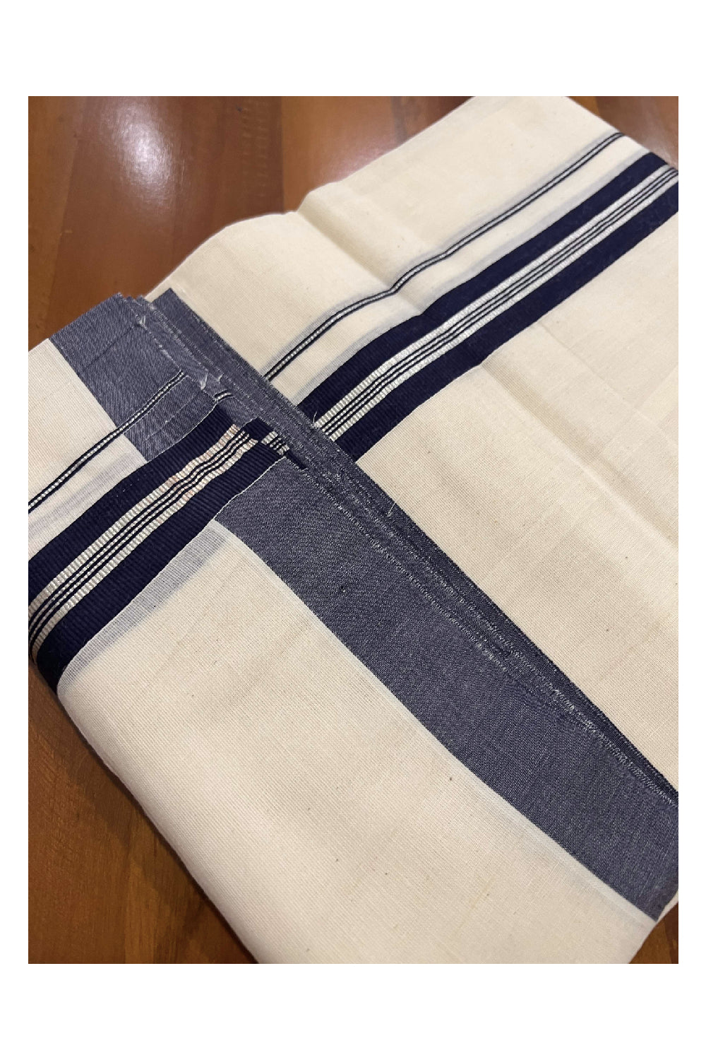 Off White Cotton Mundu with Navy Blue and Silver Kasavu Border (South Indian Dhoti)