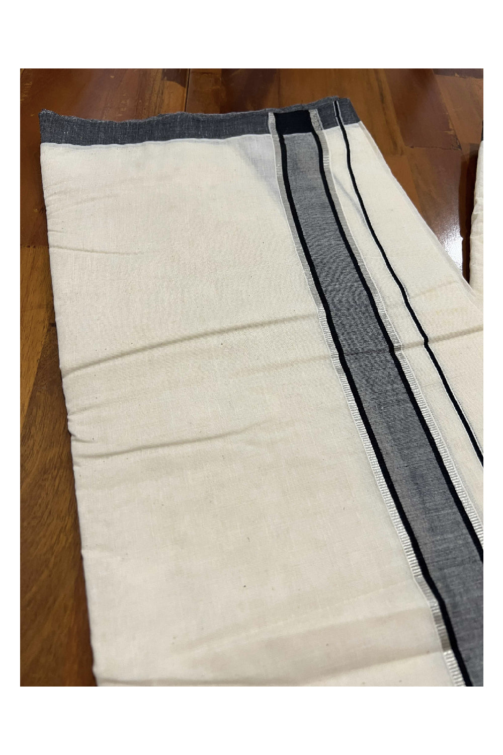 Off White Cotton Mundu with Black and Silver Kasavu Border (South Indian Dhoti)