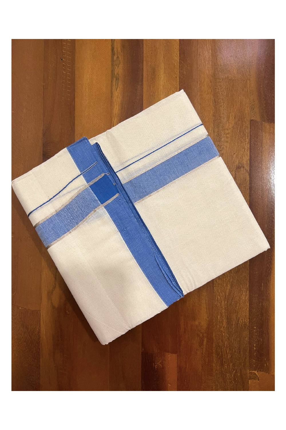 Off White Cotton Mundu with Blue and Silver Kasavu Border (South Indian Dhoti)