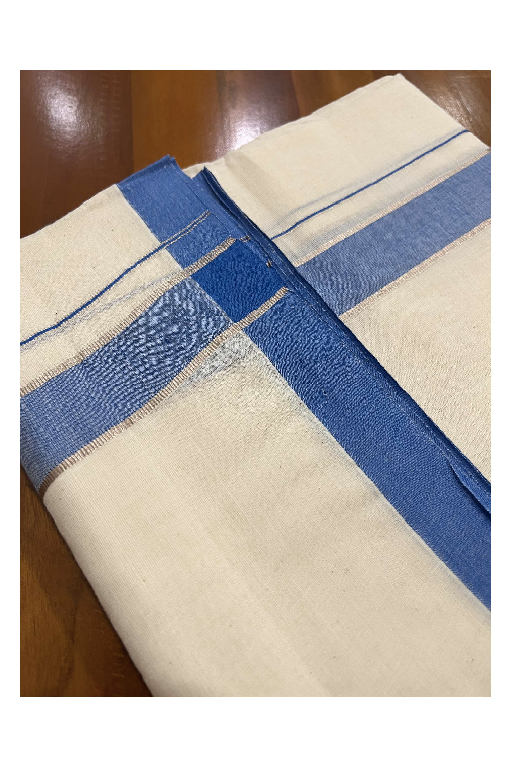 Off White Cotton Mundu with Blue and Silver Kasavu Border (South Indian Dhoti)