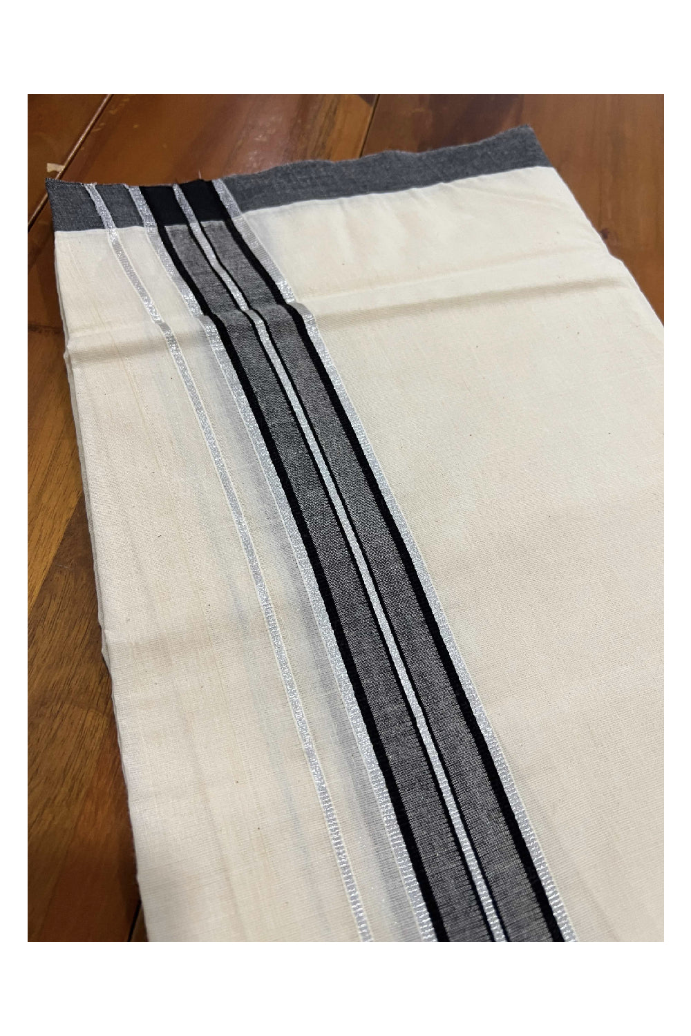 Off White Cotton Mundu with Black and Silver Kasavu Border (South Indian Dhoti)