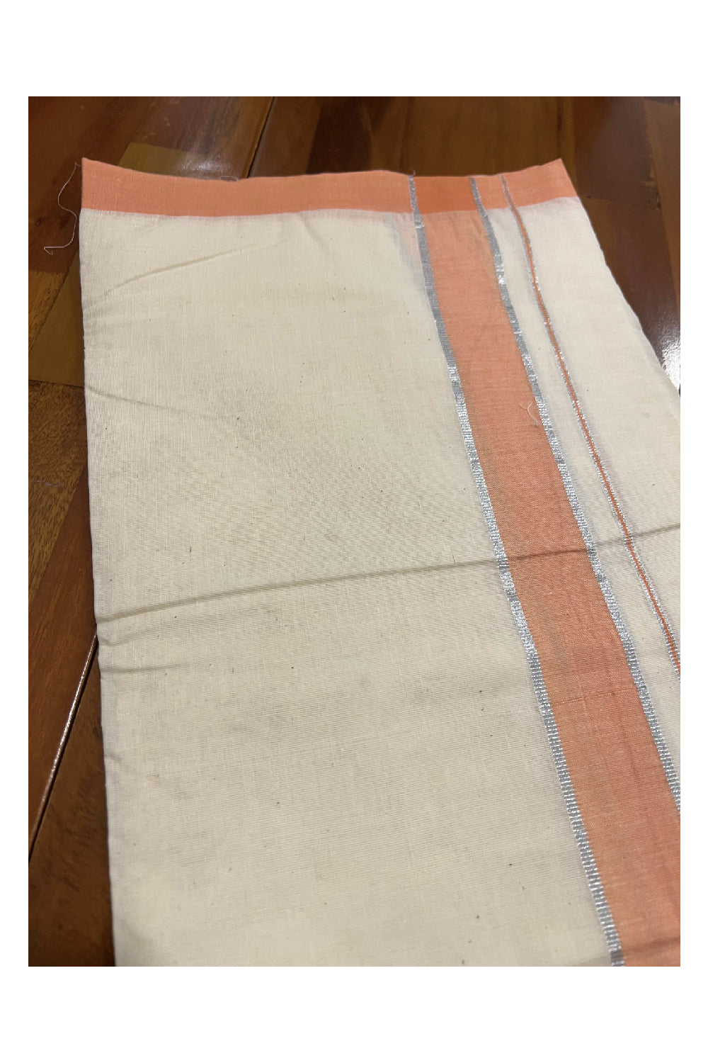 Off White Cotton Mundu with Peach and Silver Kasavu Border (South Indian Dhoti)