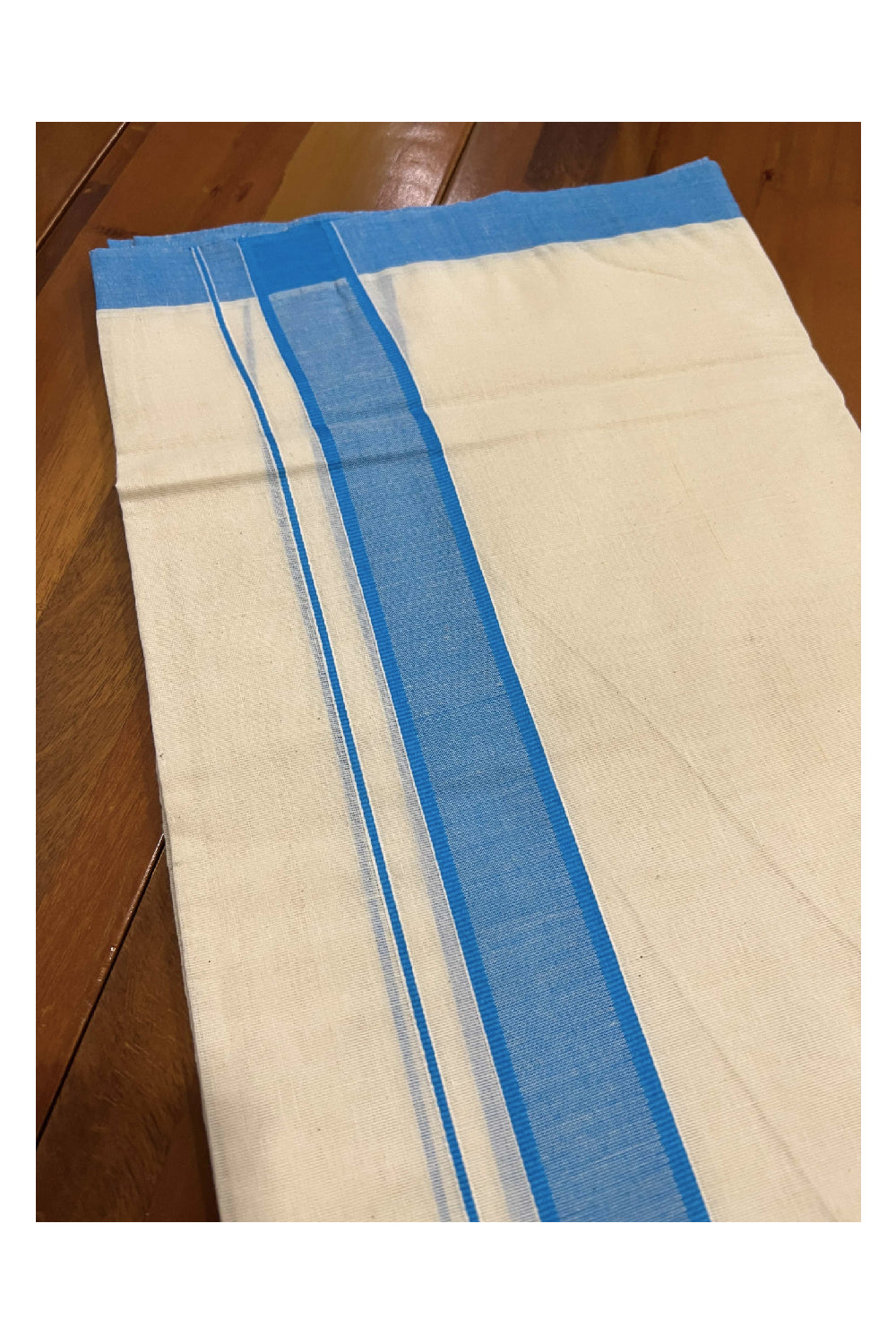 Off White Cotton Mundu with Blue Border (South Indian Dhoti)