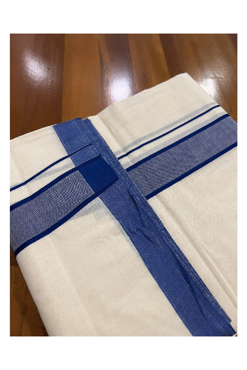 Off White Cotton Mundu with Dark Blue Border (South Indian Dhoti)