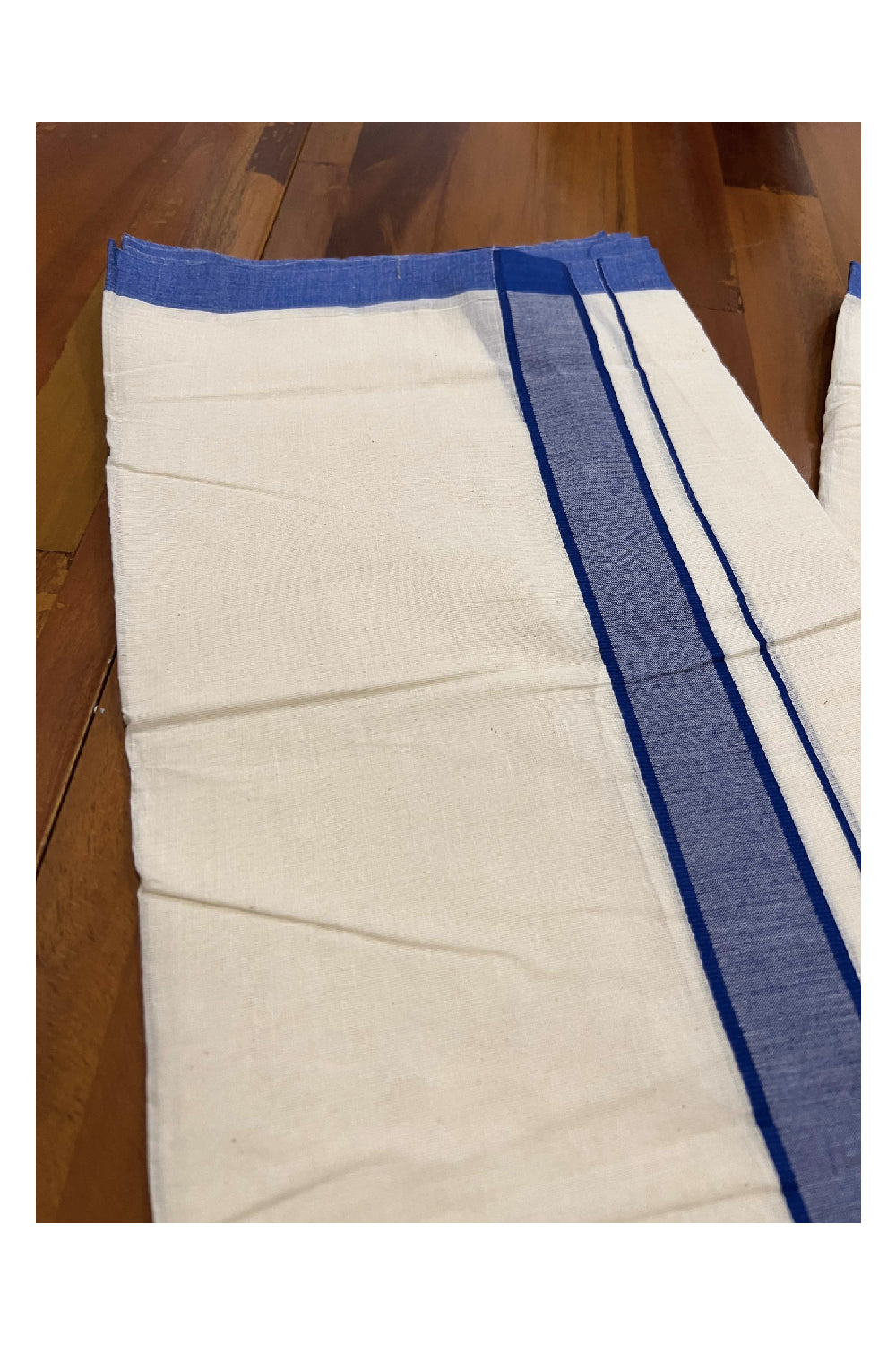 Off White Cotton Mundu with Dark Blue Border (South Indian Dhoti)