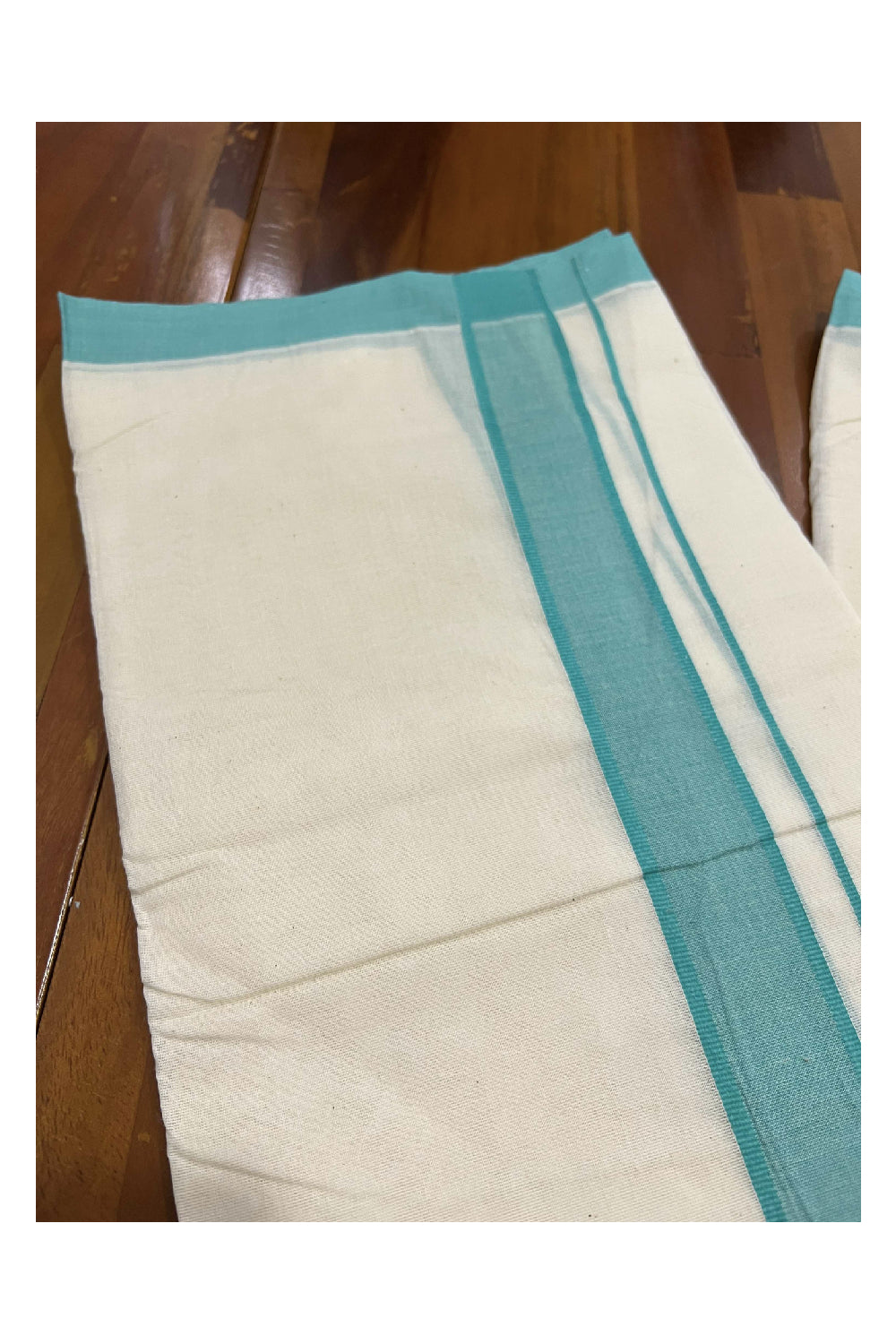 Off White Cotton Mundu with Turquoise Border (South Indian Dhoti)