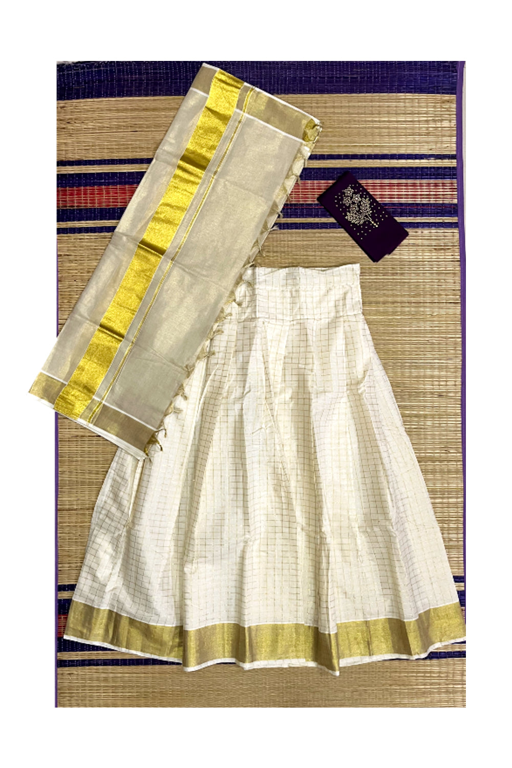 Semi Stitched Dhavani Set with Kasavu Check Design Cotton Pavada and Violet Bead Work Blouse Piece