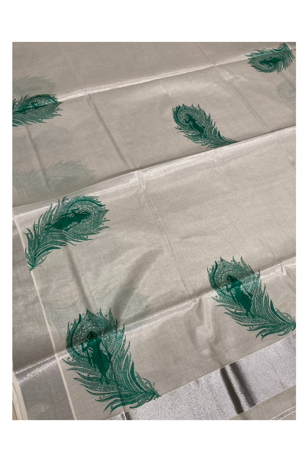 Silver Tissue Saree with Green Krishna and Feather Mural Design