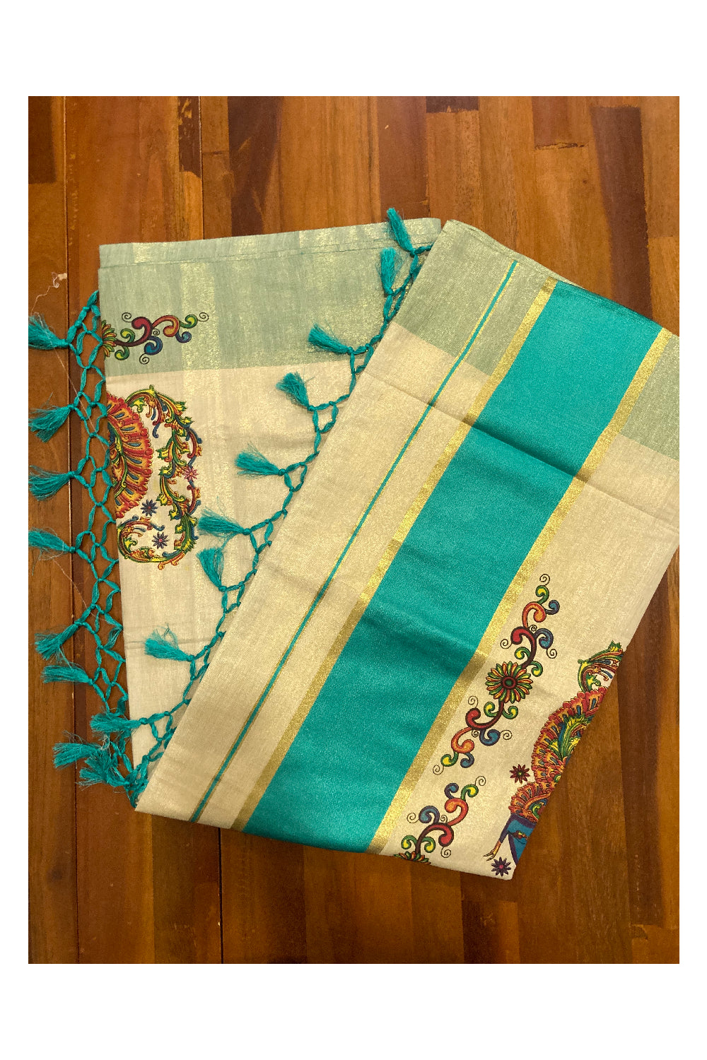 Southloom Onam 2022 Kerala Tissue Kasavu Saree in Turquoise Kara with Peacock Mural Design