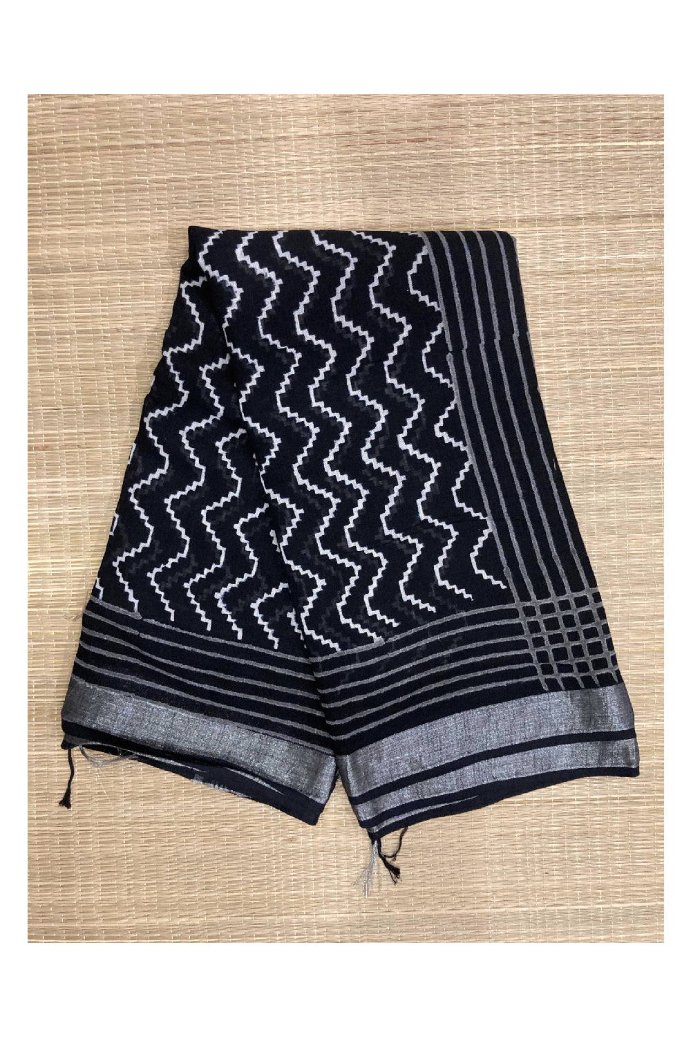 Southloom Linen Black Designer Saree with White Patterns and Tassels