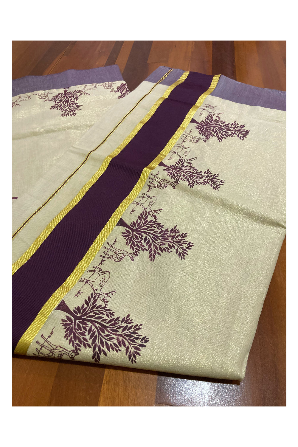 Kerala Tissue Kasavu Saree with Brown Block Prints