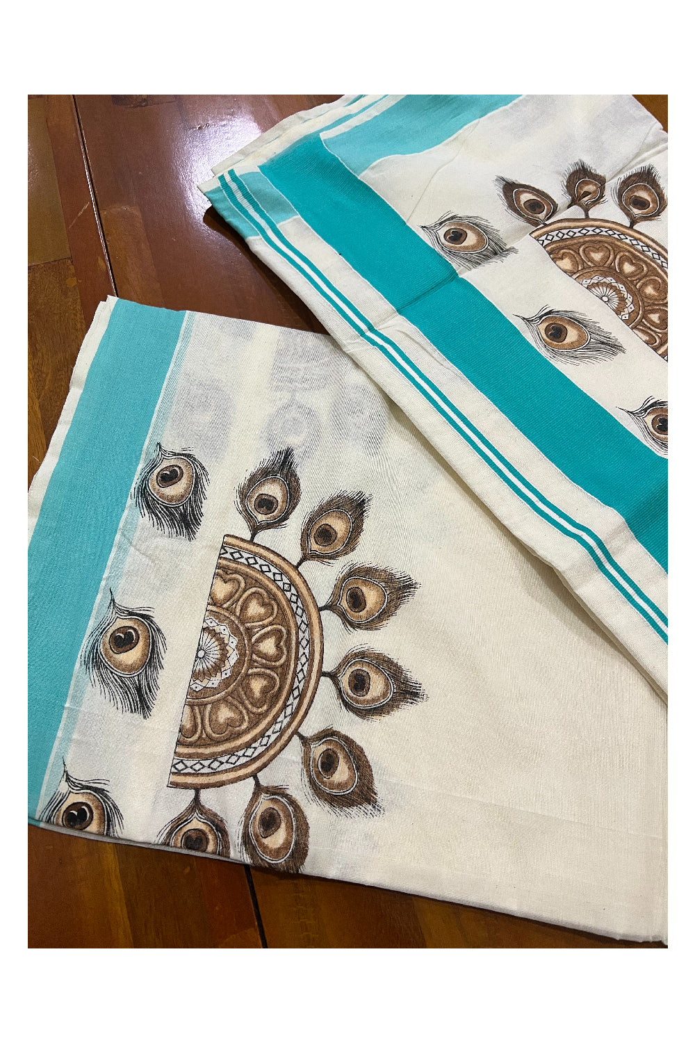 Kerala Pure Cotton Saree with Mural Printed Semi Circle Feather Design and Turquoise Border