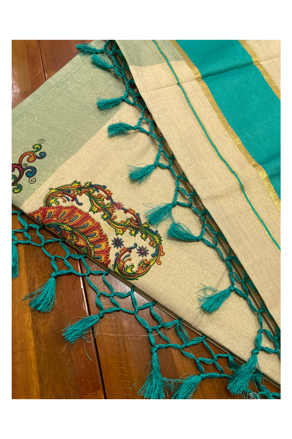 Southloom Onam 2022 Kerala Tissue Kasavu Saree in Turquoise Kara with Peacock Mural Design