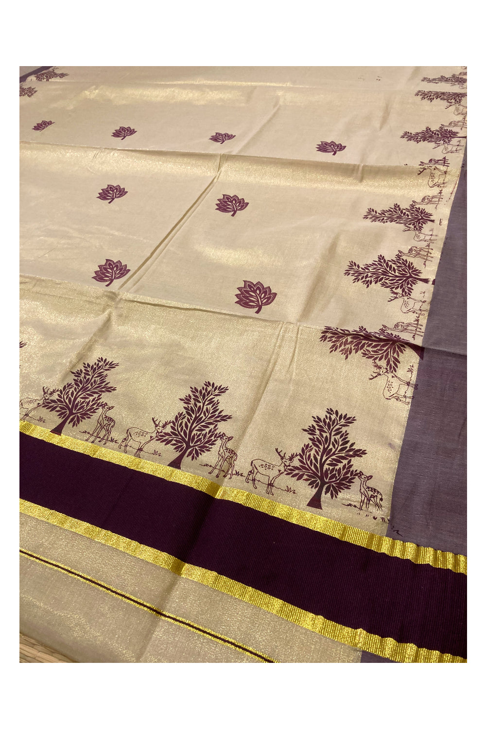 Kerala Tissue Kasavu Saree with Brown Block Prints