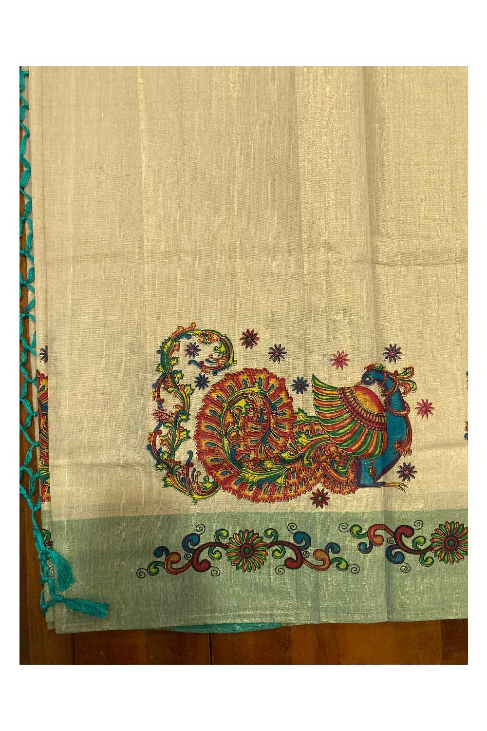 Southloom Onam 2022 Kerala Tissue Kasavu Saree in Turquoise Kara with Peacock Mural Design