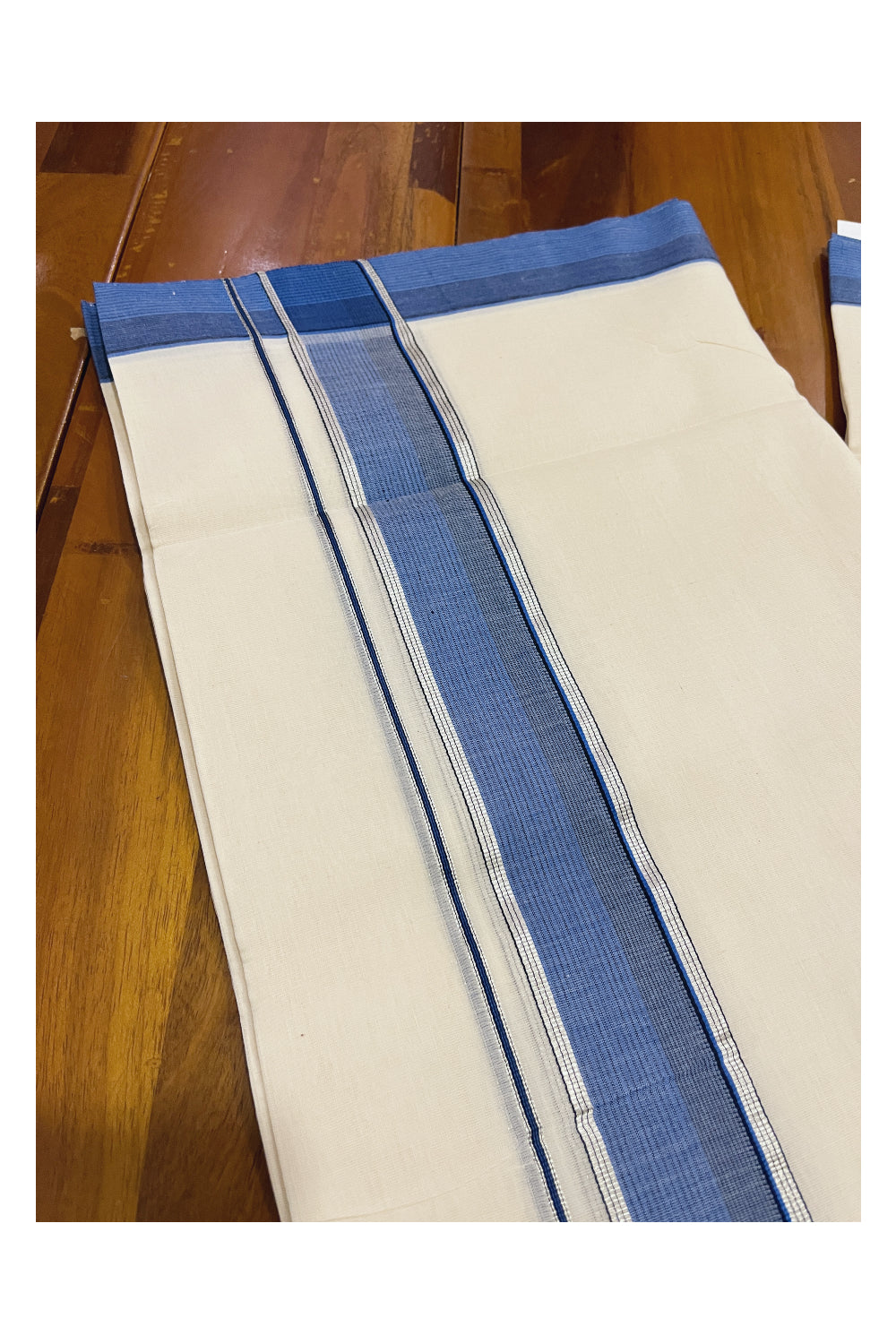 Southloom Premium Unakkupaavu Handloom Mundu with Silver Kasavu and Blue Border (South Indian Kerala Dhoti)