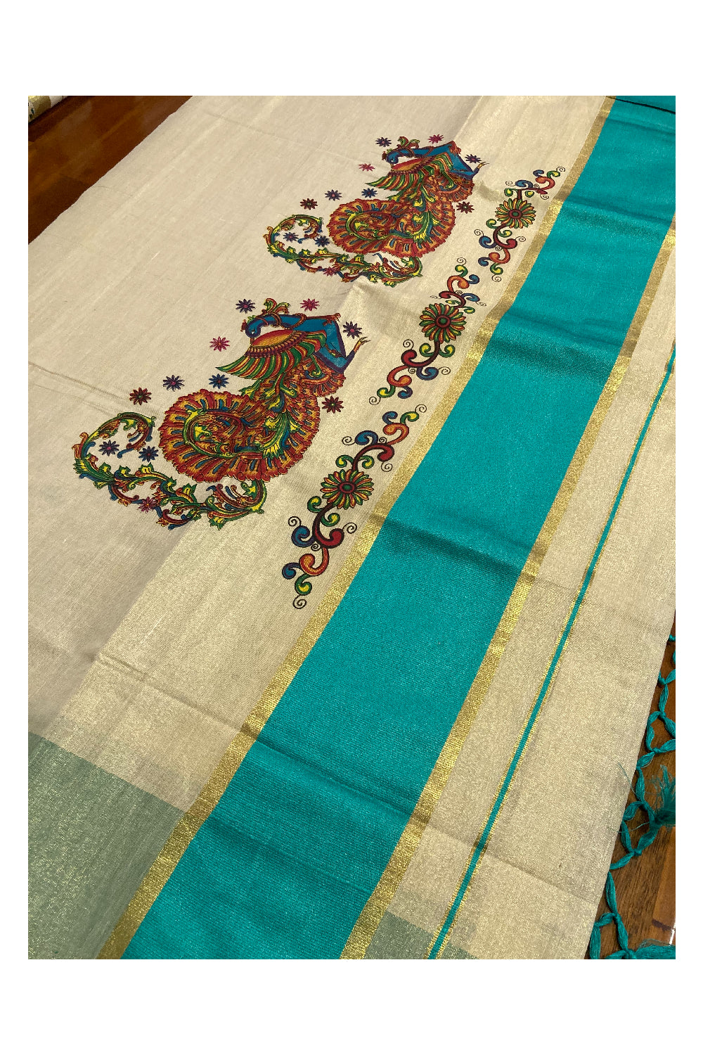 Southloom Onam 2022 Kerala Tissue Kasavu Saree in Turquoise Kara with Peacock Mural Design