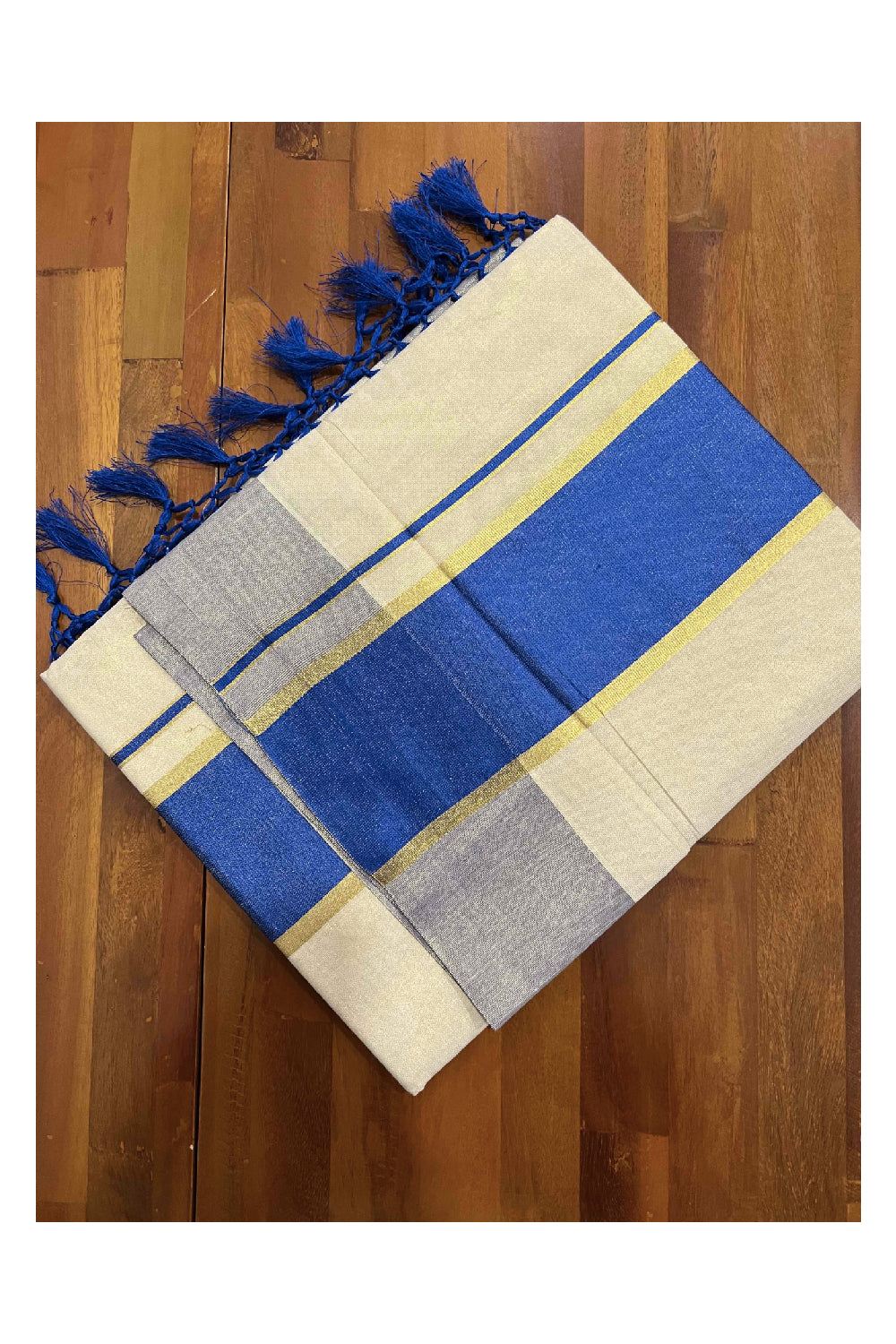 Kerala Kasavu Tissue Saree with Blue Kara and Border with Tassels