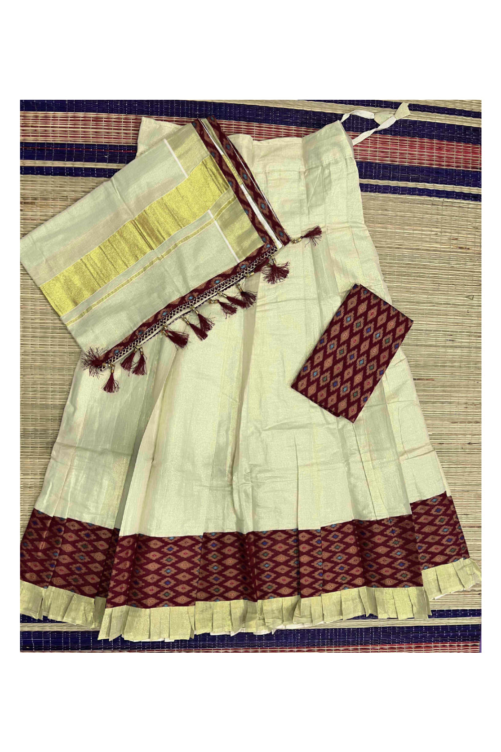Kerala Tissue Stitched Dhavani Set with Blouse Piece and Neriyathu in with Maroon Accents