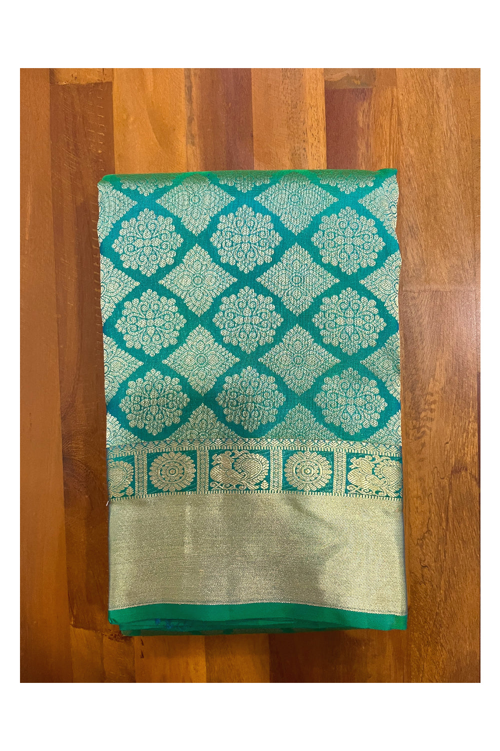 Southloom Double Warp Handloom Pure Silk Kanchipuram Green Manthrakodi Saree with Kasavu Woven Works