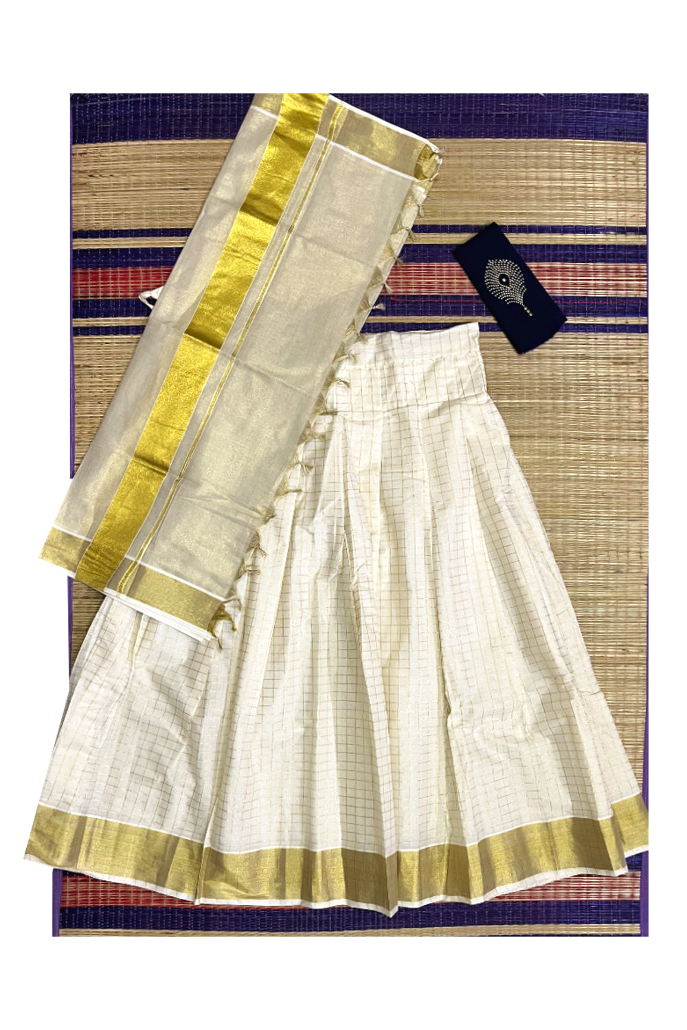 Semi Stitched Dhavani Set with Kasavu Check Design Cotton Pavada and Blue Bead Work Blouse Piece