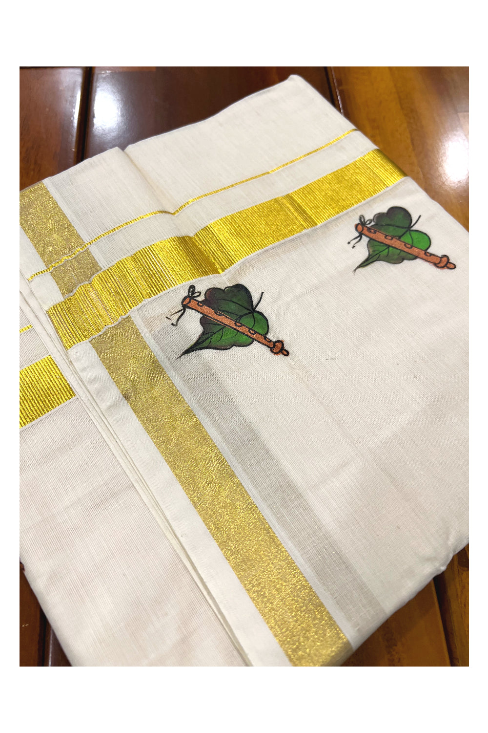 Pure Cotton Kasavu Mundu with Mural Hand Painted Leaf and Flute Design (South Indian Dhoti)