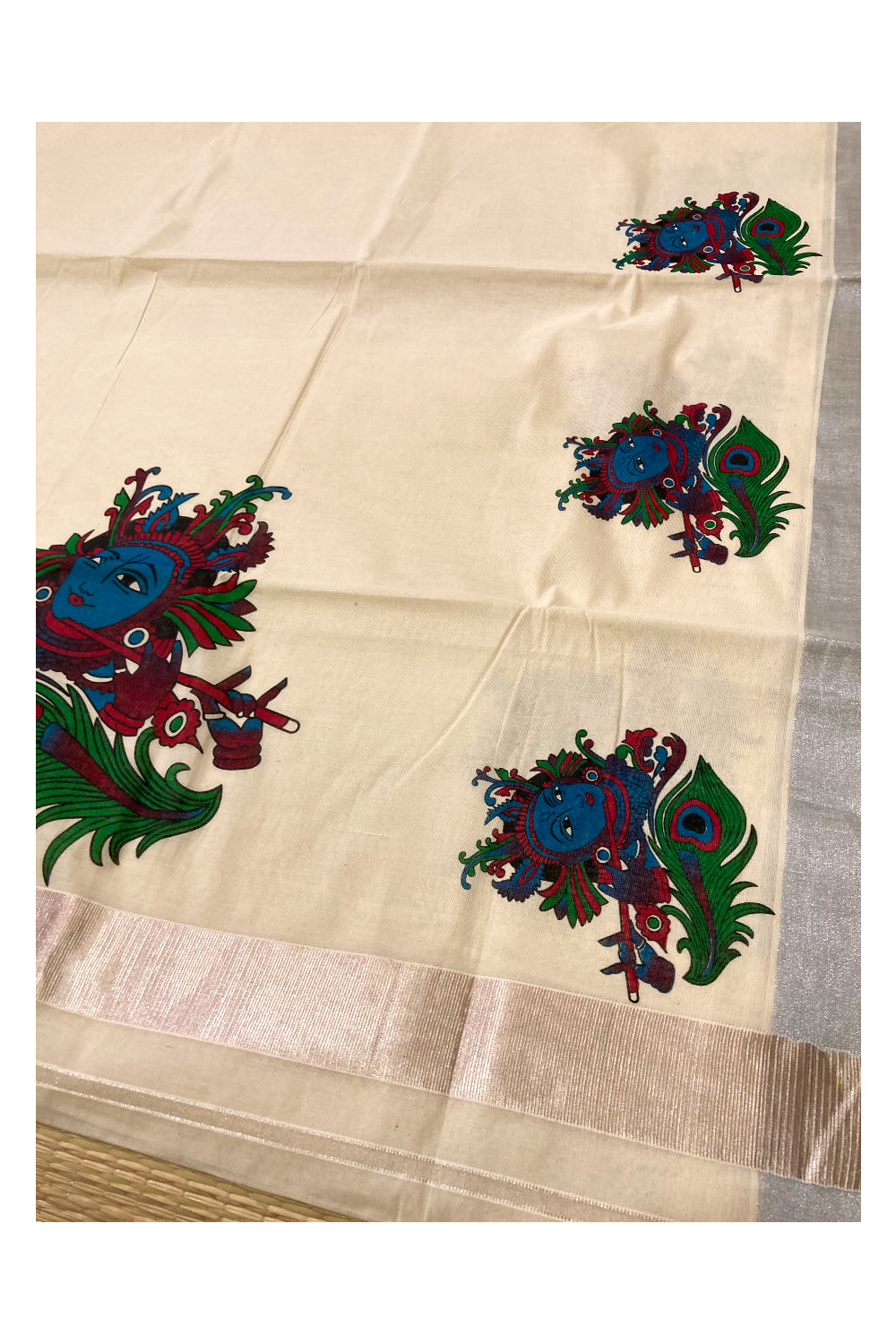 Pure Cotton Kerala Saree with Krishna Face Mural Prints and Silver Border