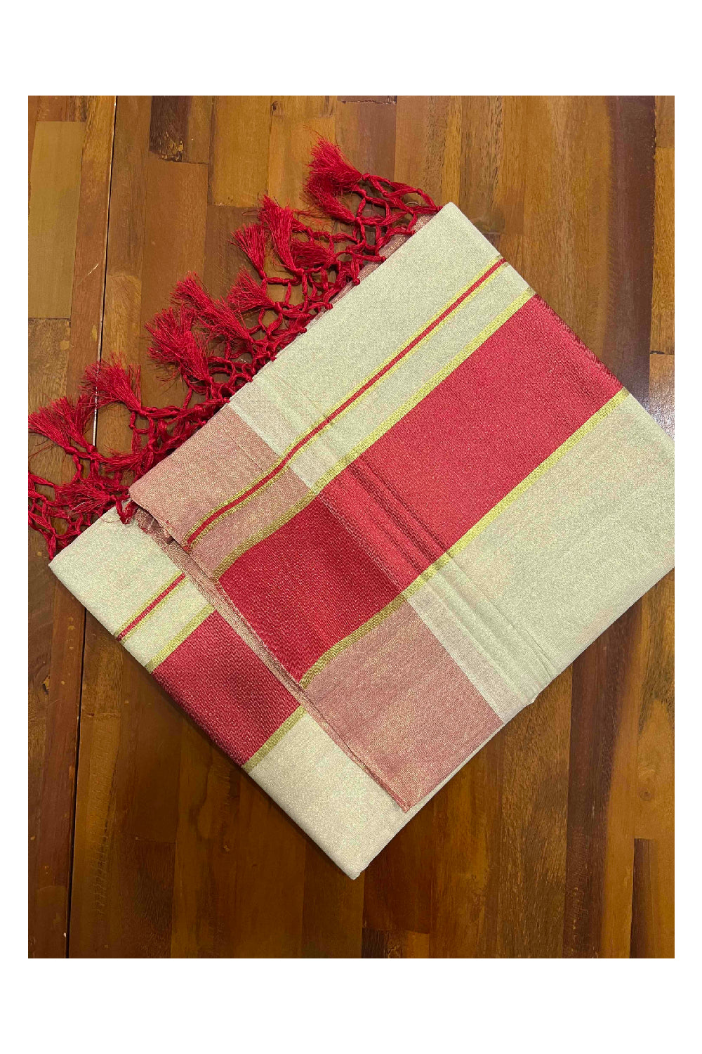 Kerala Kasavu Tissue Saree with Red Kara and Border with Tassels