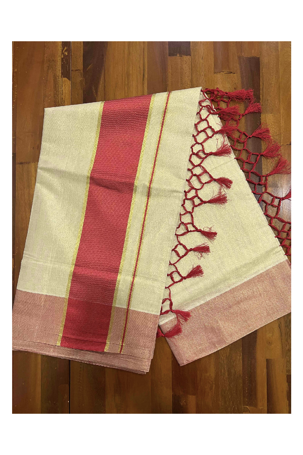 Kerala Kasavu Tissue Saree with Red Kara and Border with Tassels