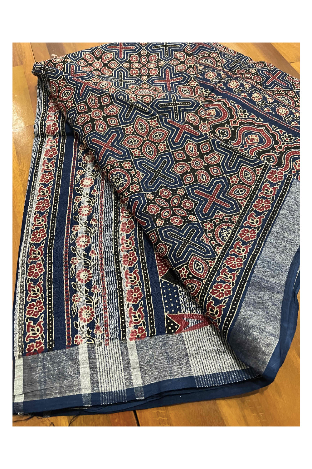 Southloom Linen Designer Saree with Ajrakh Prints on Dark Blue Body and Tassels on Pallu