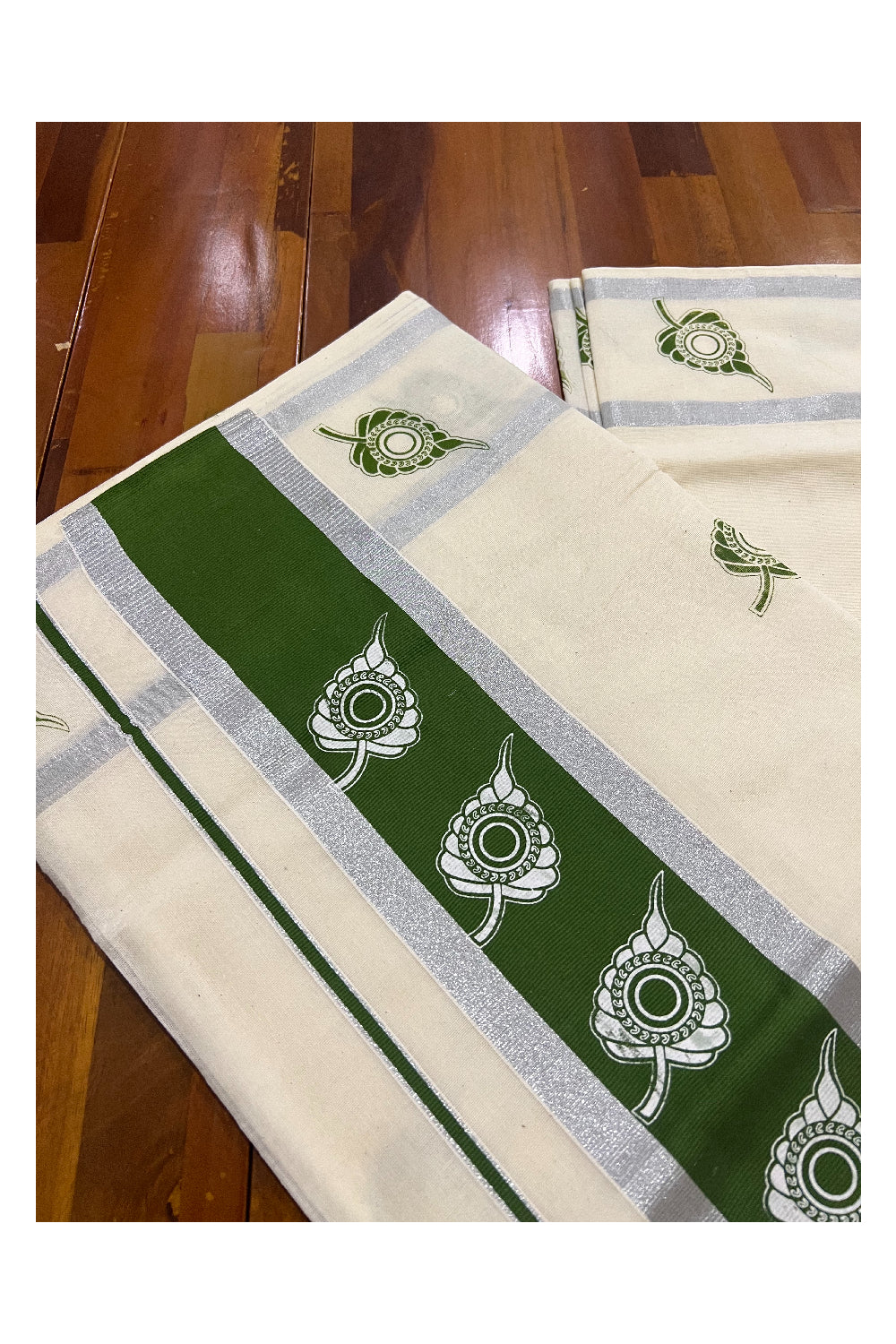 Pure Cotton Kerala Silver Kasavu Saree with White Leaf Block Printed Design in Bottle Green Pallu